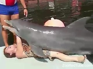 Sexy granny gets dry-humped by a kinky dolphin